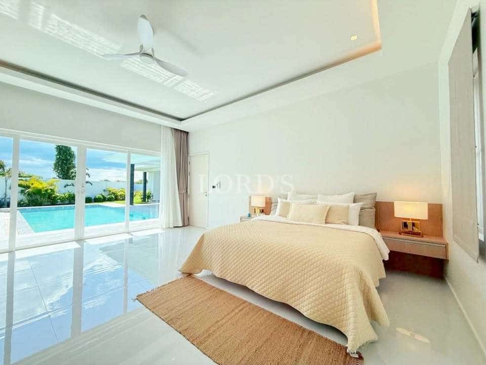 Modern bedroom with pool view